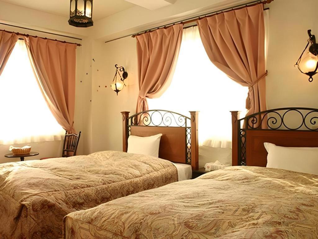 Arabian Art Hotel & Gallery Onjuku Esterno foto